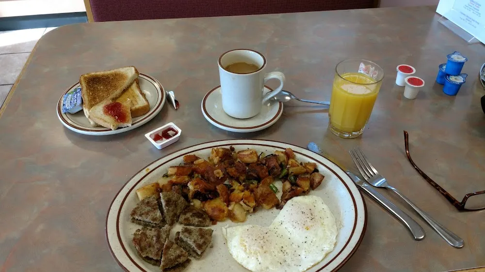 Two Eggs over Easy Home Fries with Pork Sausage Patties